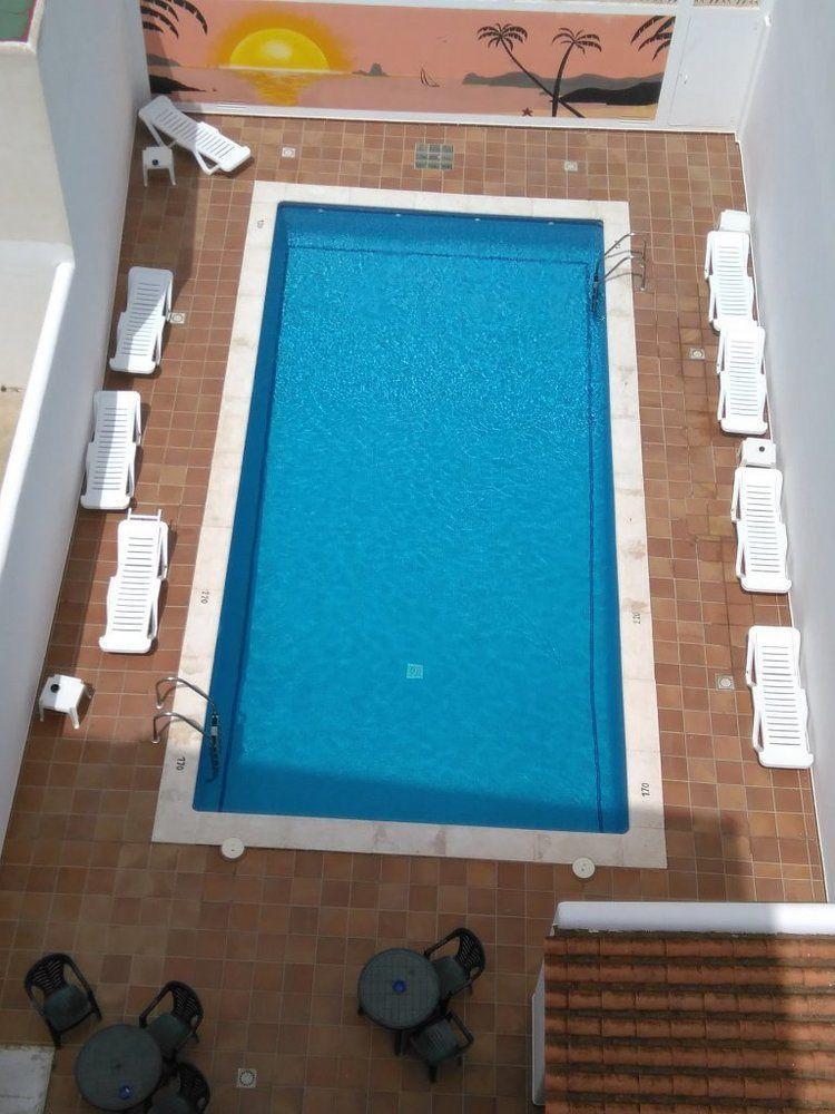 Hostal Horizonte Sant Antoni de Portmany Extérieur photo Swimming pool