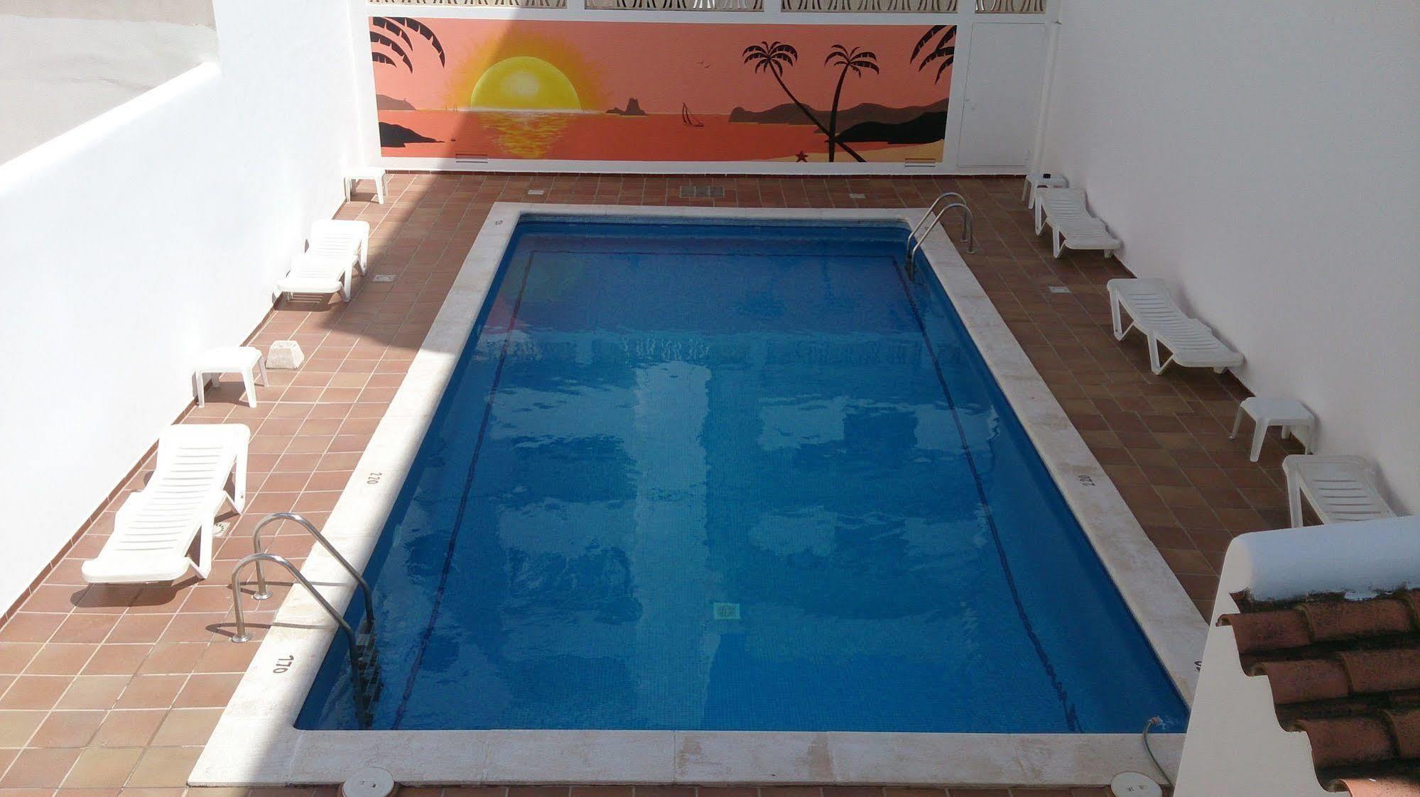 Hostal Horizonte Sant Antoni de Portmany Extérieur photo A swimming pool